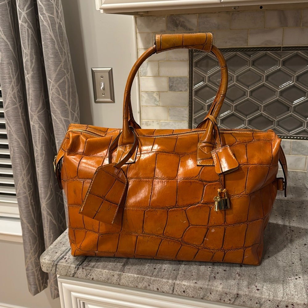 Dooney and Bourke leather vintage travel bag